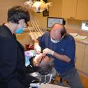 Dr. Hickey performing dental implants procedure at Sound to Mountain Dental