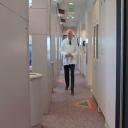Dr. Steven Reeves in the hallway of his dental office in Des Moines WA 9819