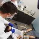 Hugo childrens dentist Dr. Brent Sorenson working on one of his patients at