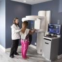 Dental hygienist with patient at Dental Wellness Team