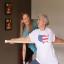 Holistic Yoga Therapist Moriah Diederich works with Evelyn in a private yog