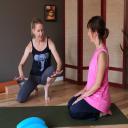 Jocelyn learns yoga from Moriah Diederich at Yoga Mojo & Movement Thera