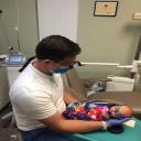 Dr Warcup with pedaitric patient at North Texas Smiles Pediatric Dentistry 