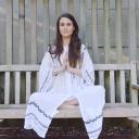 Yoga teacher practising meditation in sukhasana