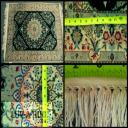 Persian rug with red dye bleed