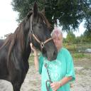 Mama and her new horse, Smoke.
