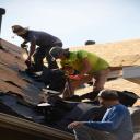 Roofers at work