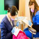 Kid's dentist Dr. Ciano working on one of her patients at Montgomery P