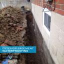 Exterior waterproofing, clean foundation wall