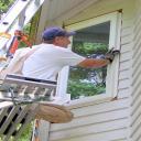 One of our highly qualified craftsmen installing a replacement window