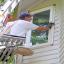 One of our highly qualified craftsmen installing a replacement window